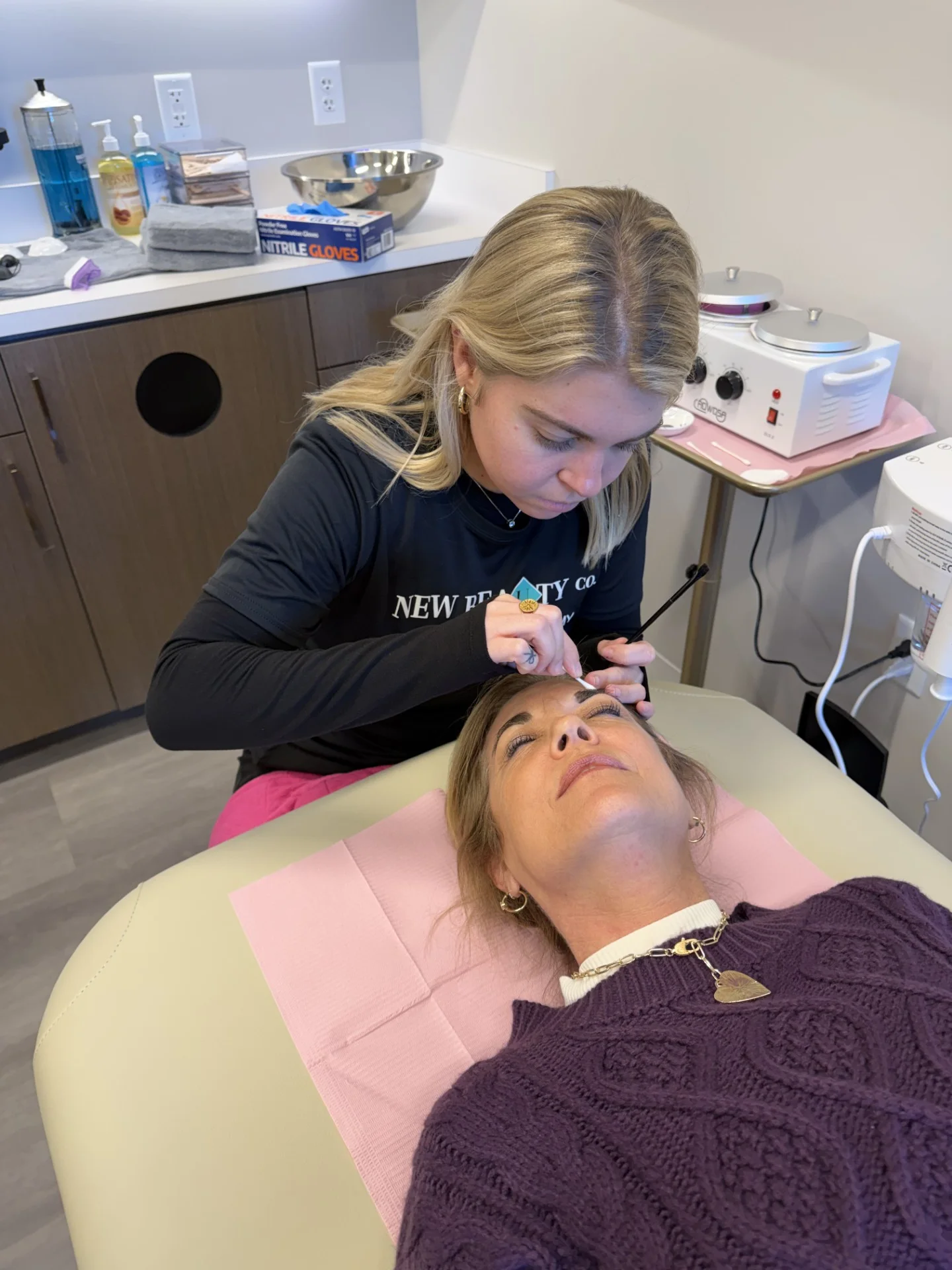 Student learning dermaplaning technique