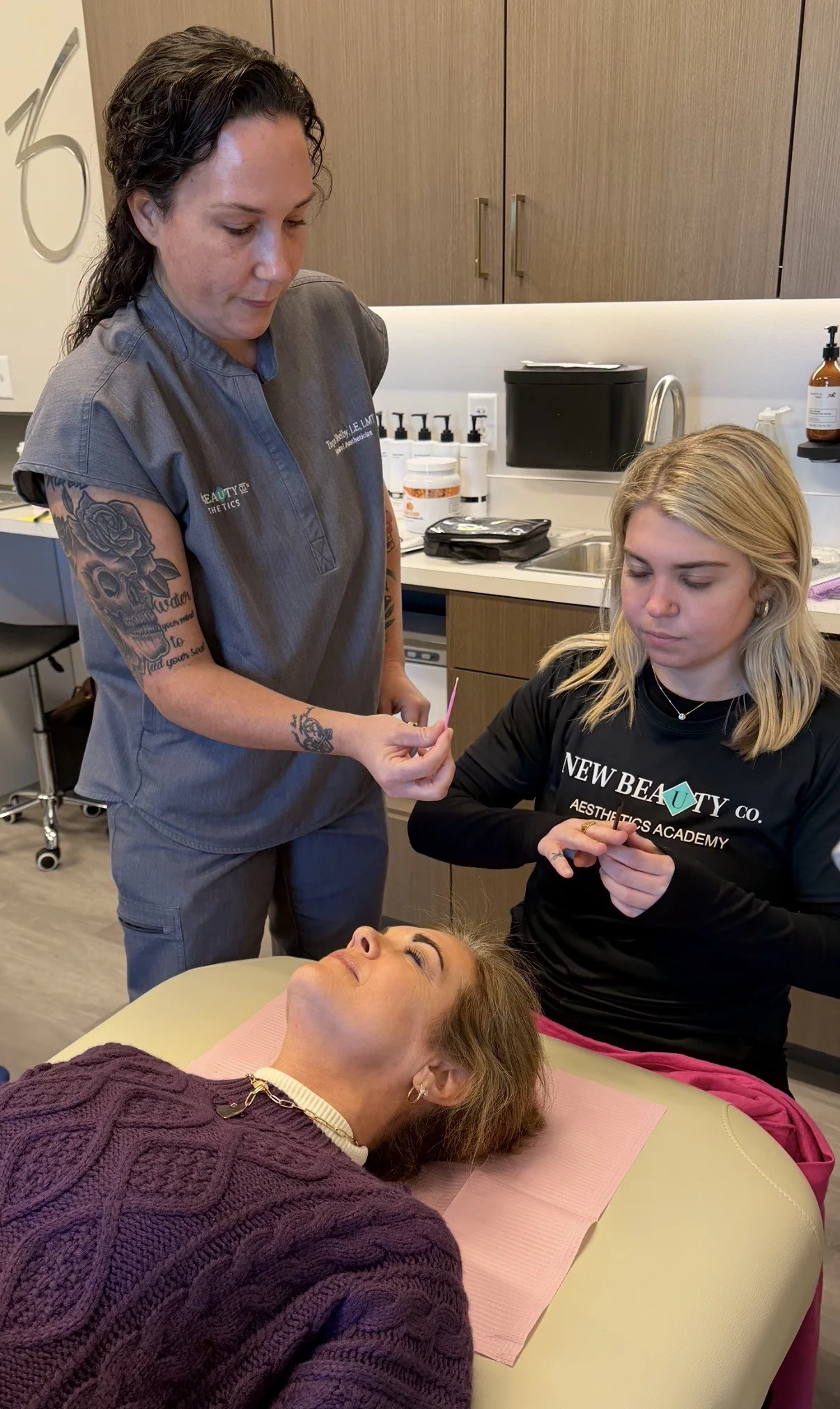 Instructor providing hands-on guidance during training