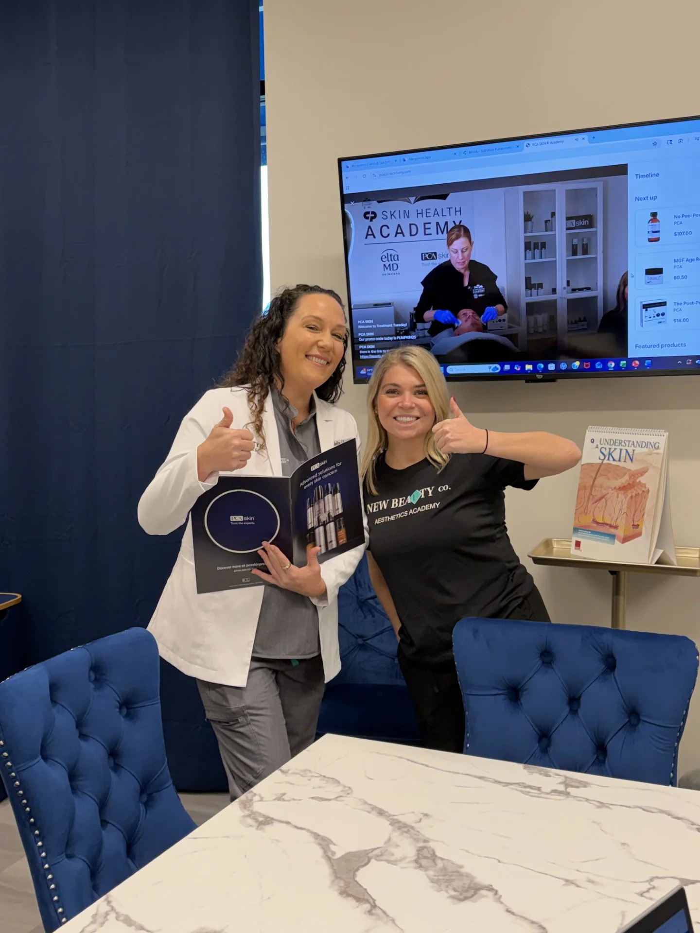 Student celebrating completion with instructor